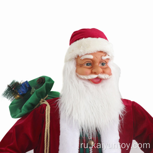 Санта -Клаус с подарочным пакетом, стоящим внутренним украшением